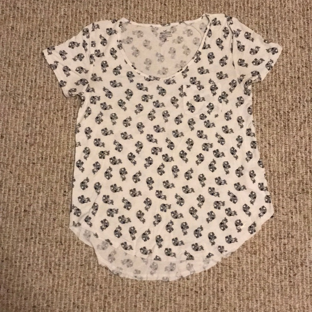 white tank top with elephant pattern